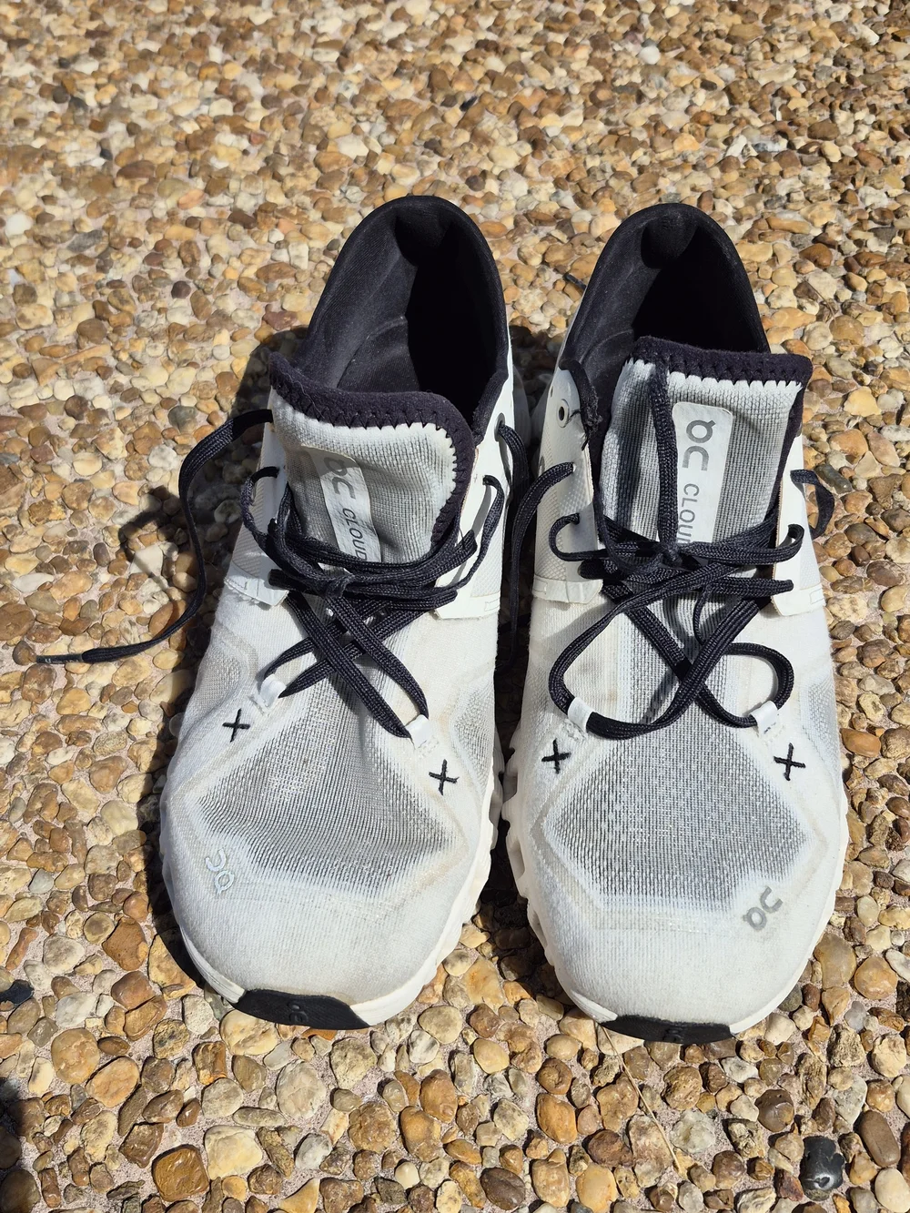 On Running Men’s Cloud Athletic Sneakers in White and Black